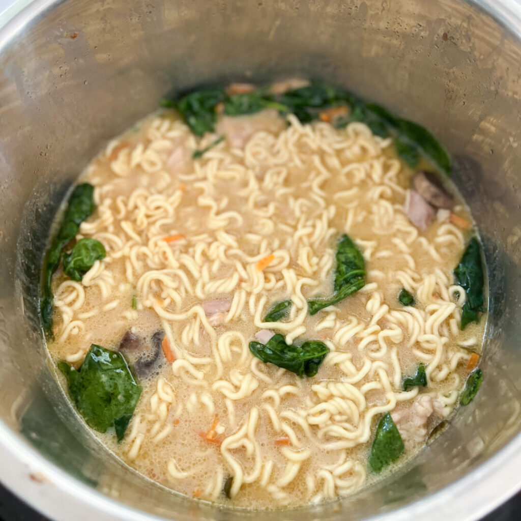 Instant Pot with chicken ramen inside