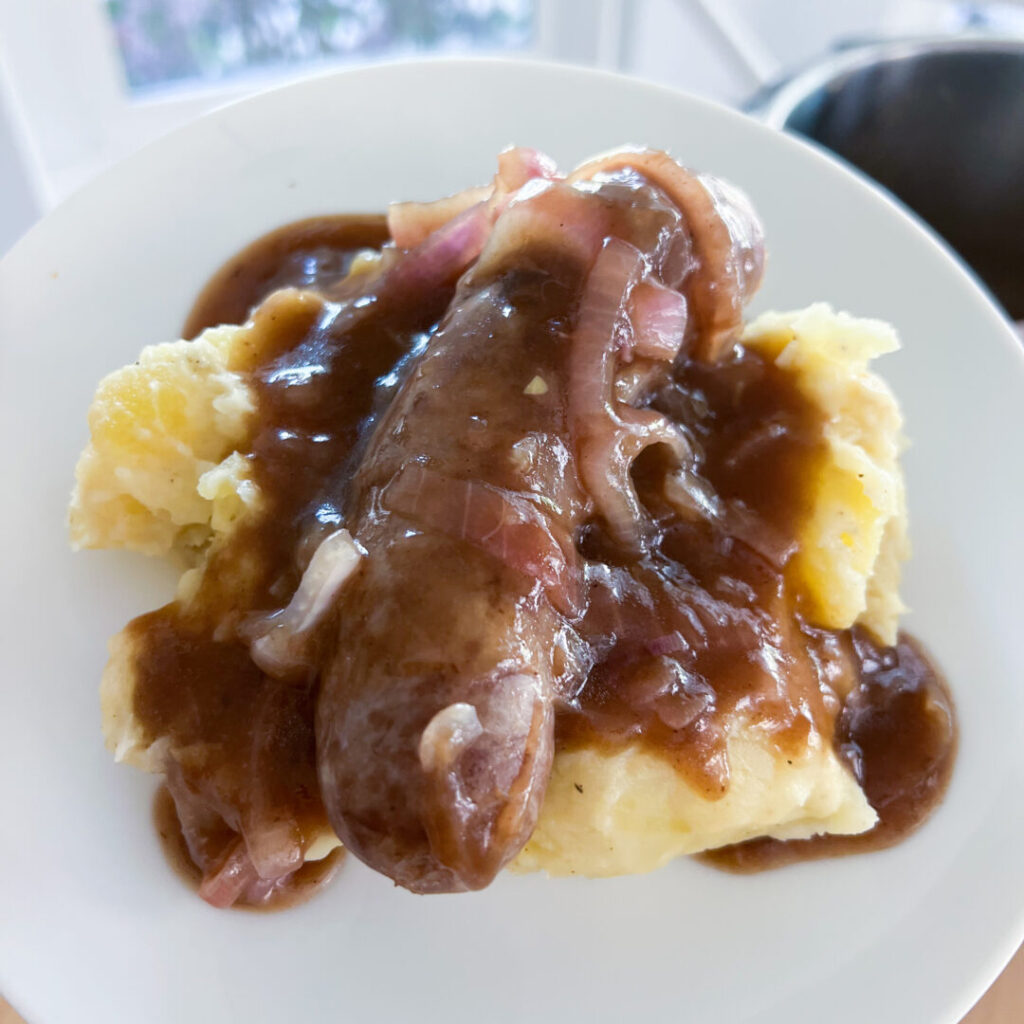 Instant Pot Beer Bangers and Mash on a plate.