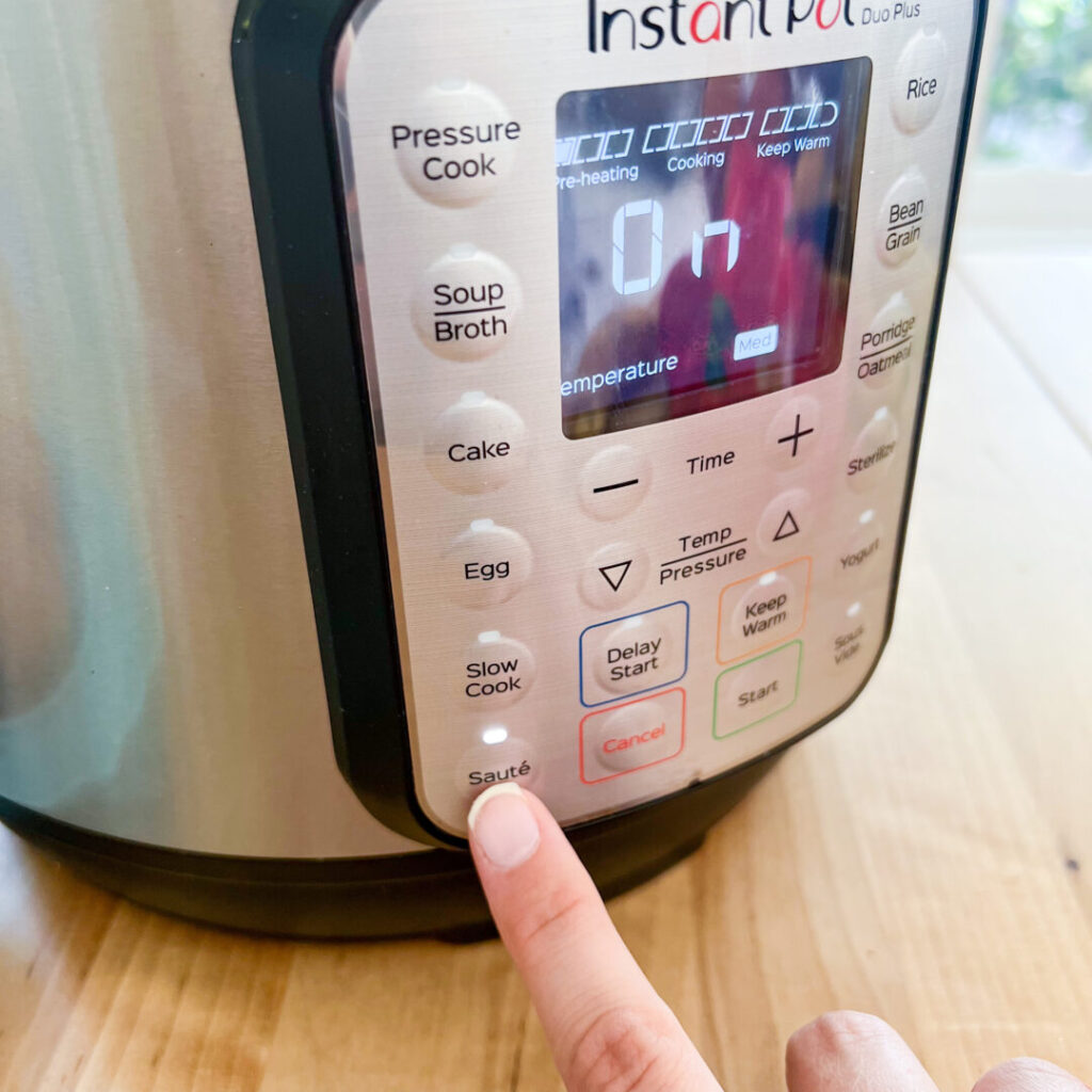 Turning on sauté mode on the Instant Pot