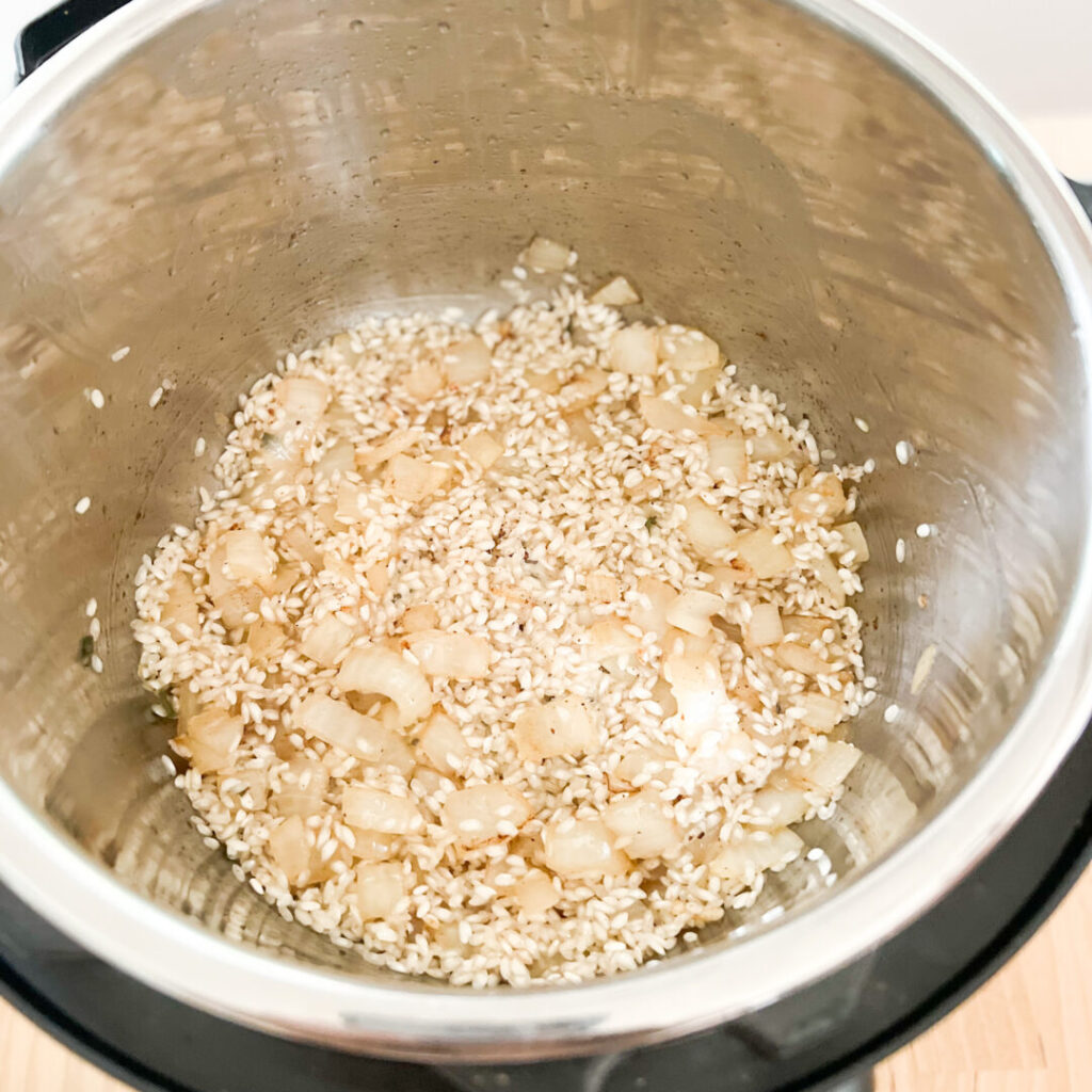 Arborio rice and onion sautéing