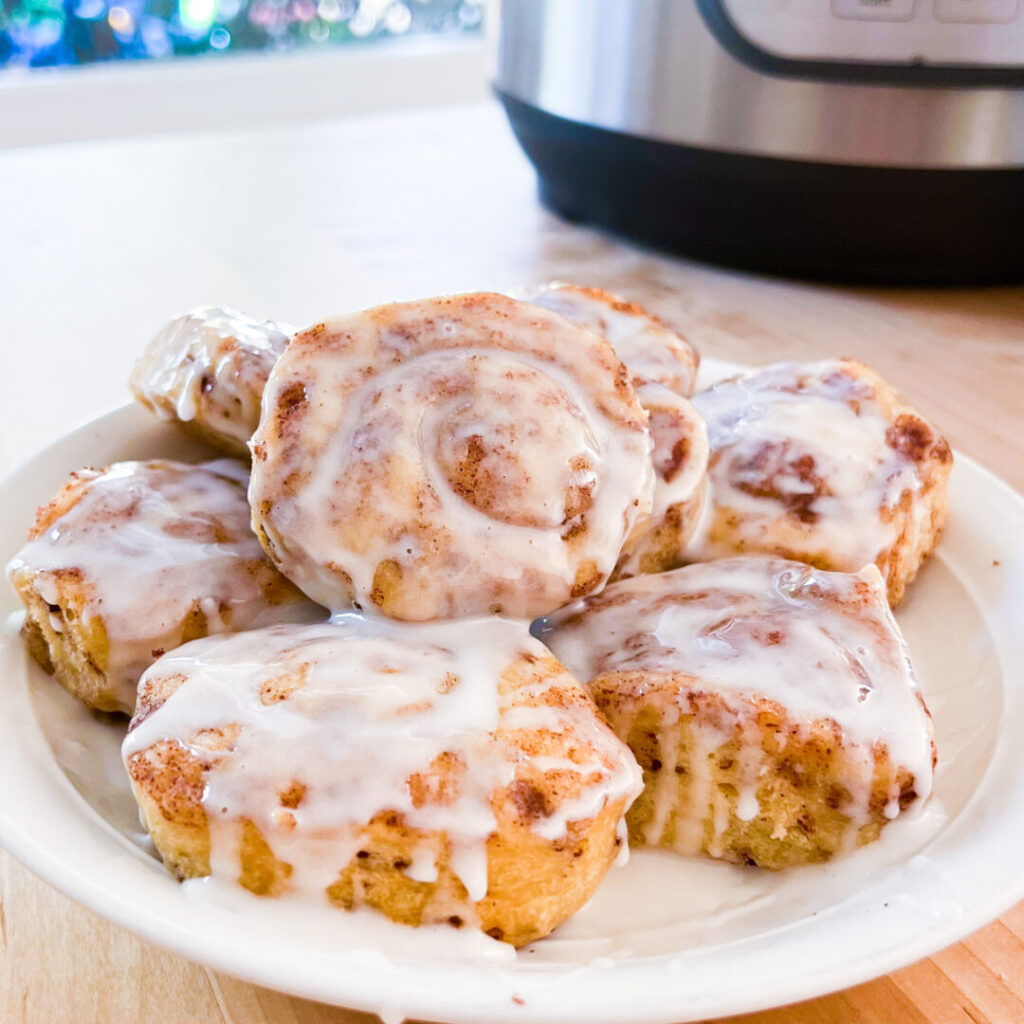 Cinnamon rolls with Instant Pot in background