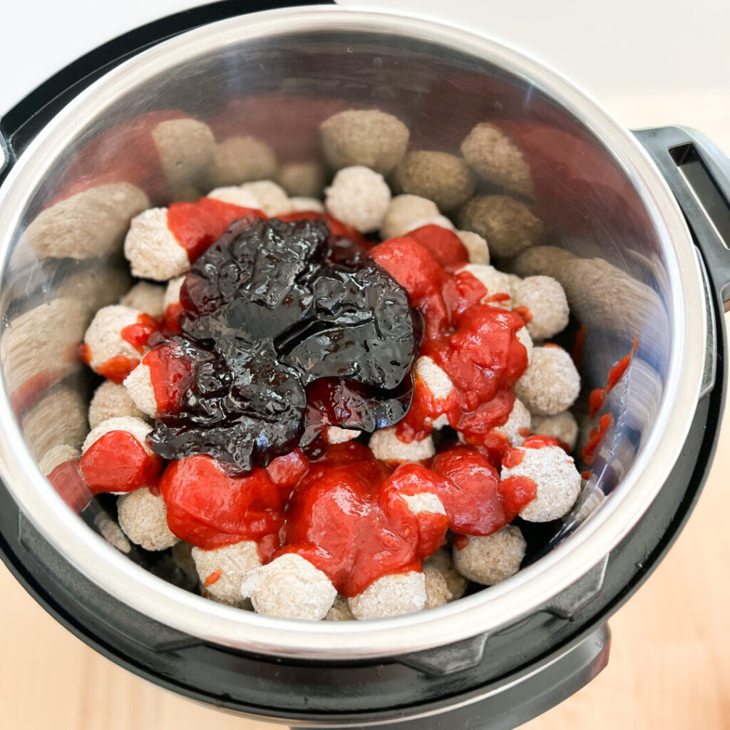 Meatballs, chili sauce, and jelly in the Instant Pot.