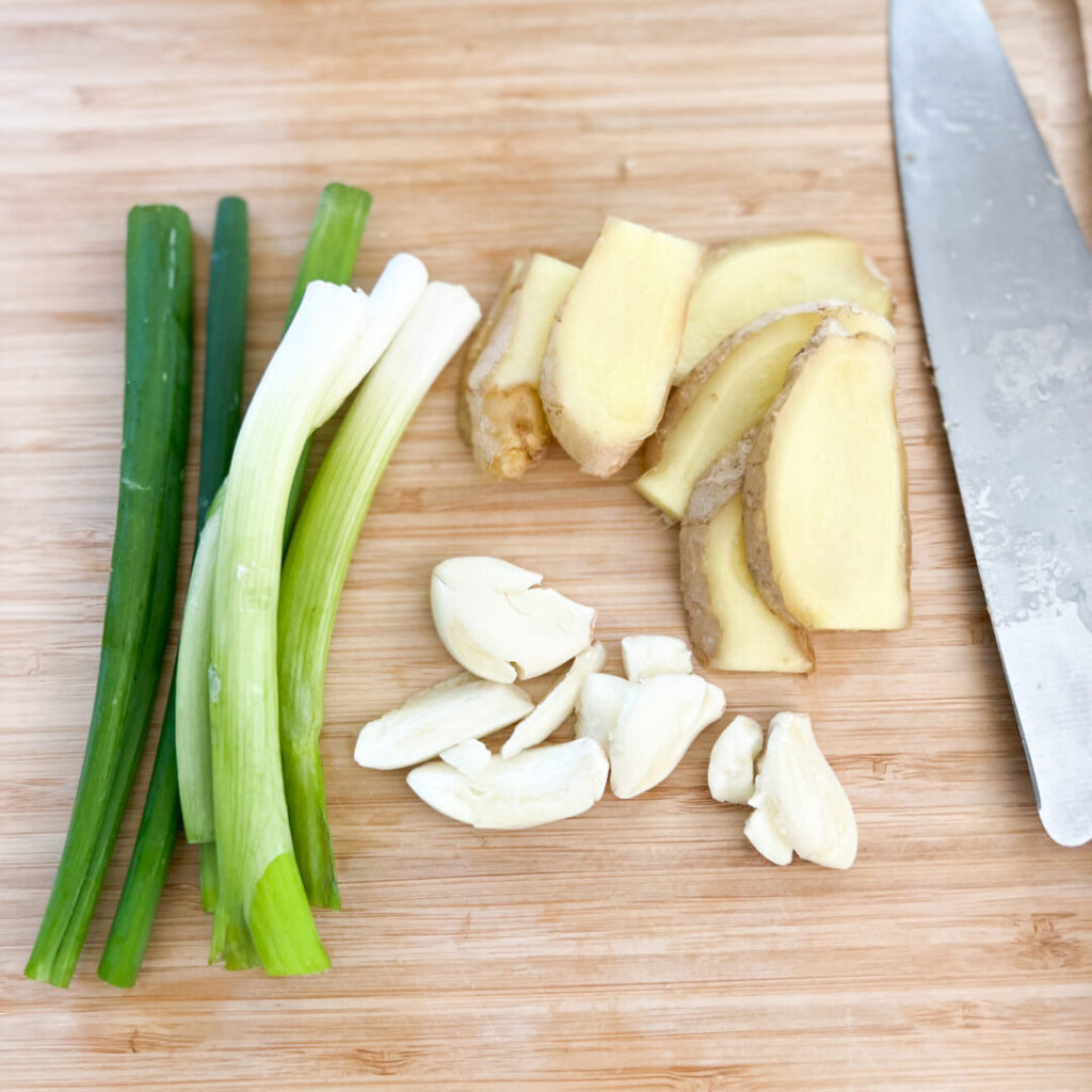 Aromatics on a cutting board.