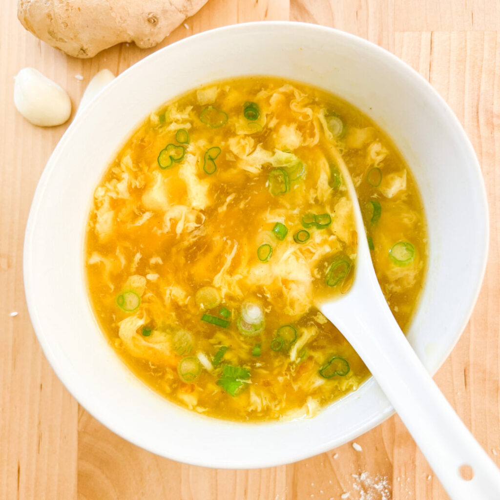 Instant Pot Egg Drop Soup in a bowl with a spoon.